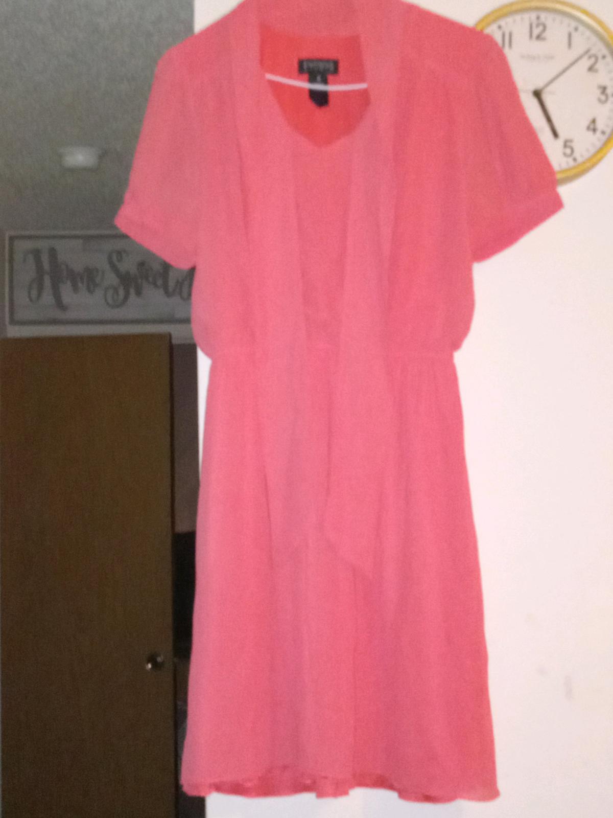This is a size 6 Enfocus Studio coral dress made in Indonesi