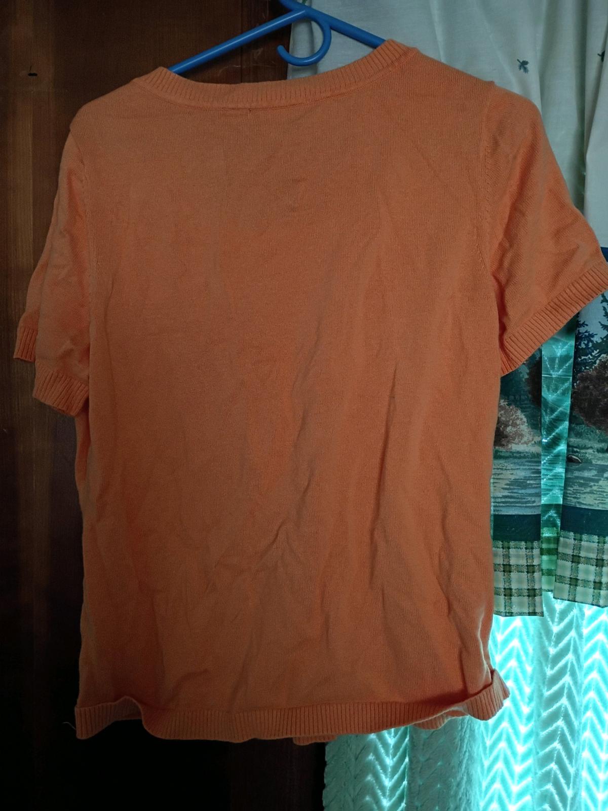 a orange blouse designer Christopher Banks