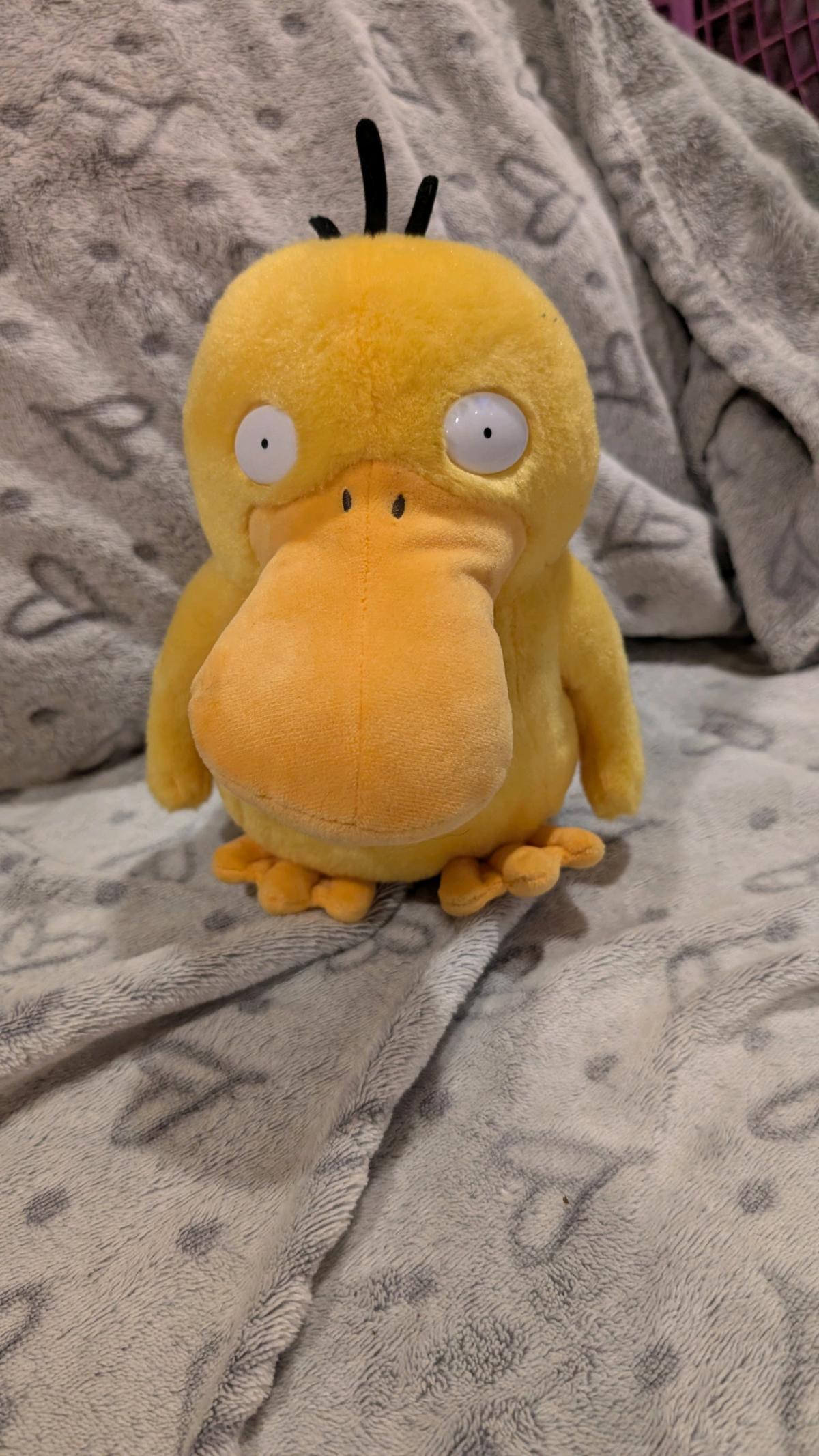 psyduck detective Pikachu plush that makes noise