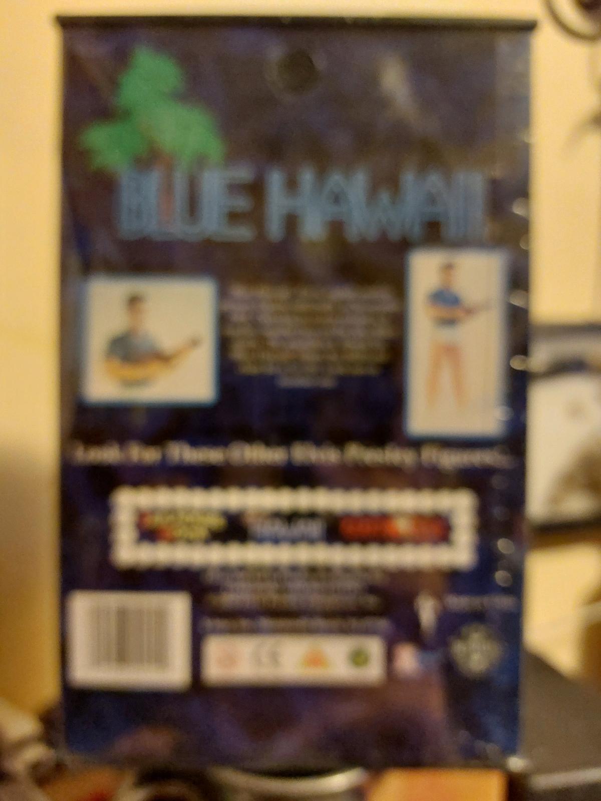 Elvis  blue Hawaii doll with surfboard