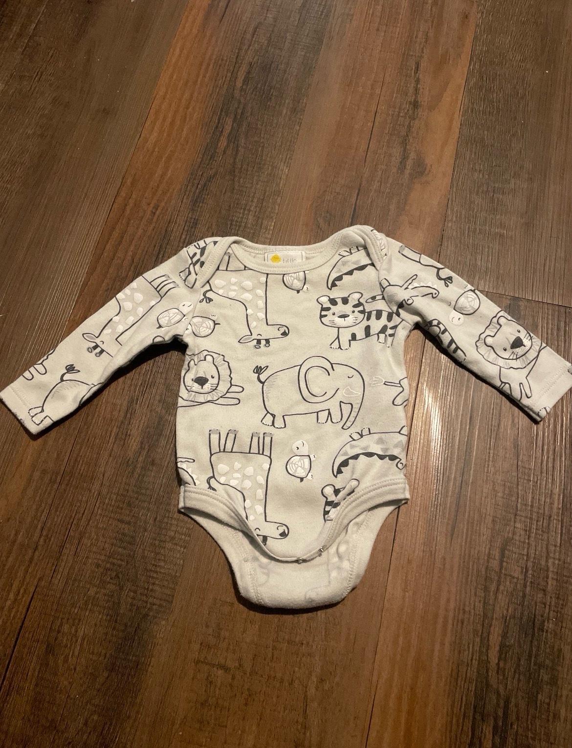 ten baby sleepers ranging in sizes 0 to 3 months