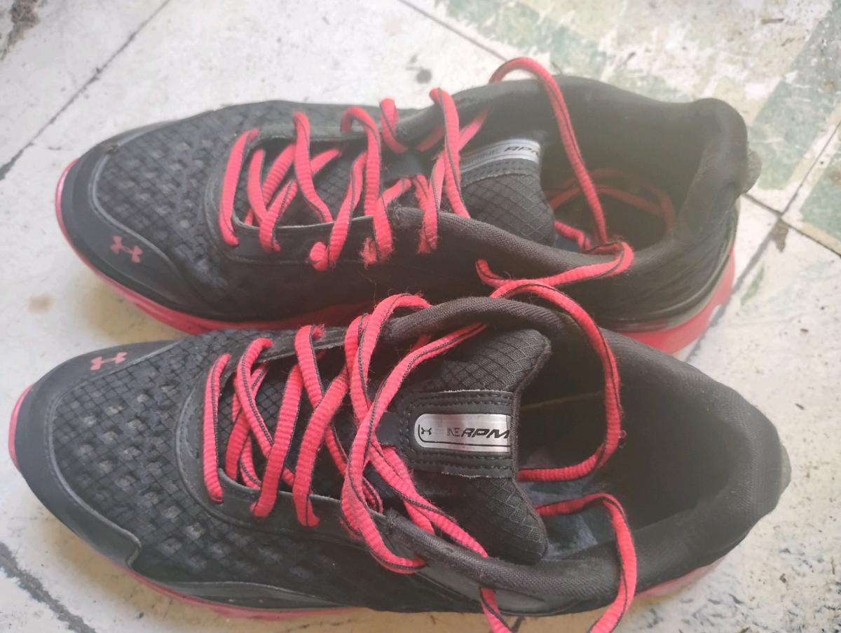 A Nice Pair of Red and Black UnderArmor Sneakers