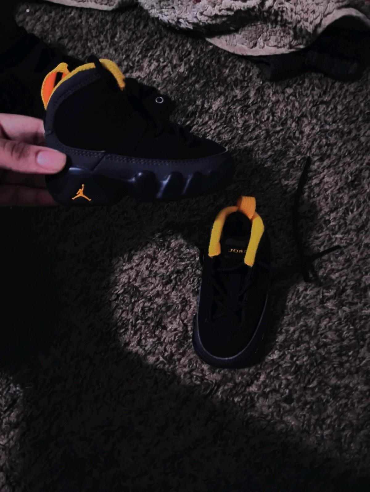 black and yellow baby boy jordans size 3y