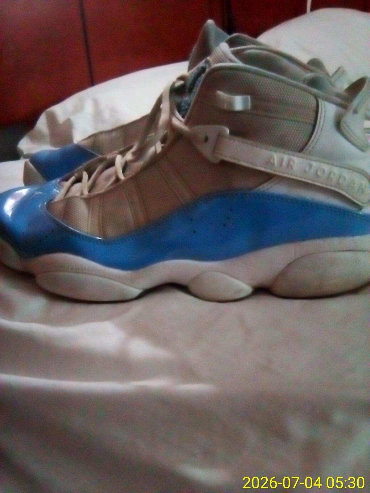blue and white Jordan 11s mens size 10