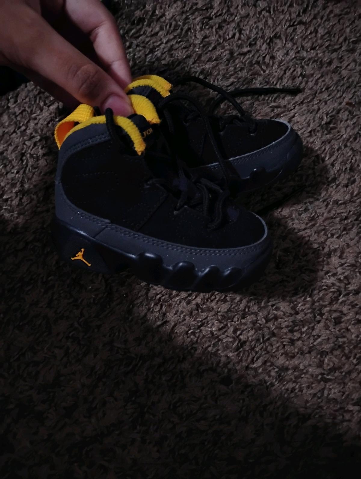black and yellow baby boy jordans size 3y