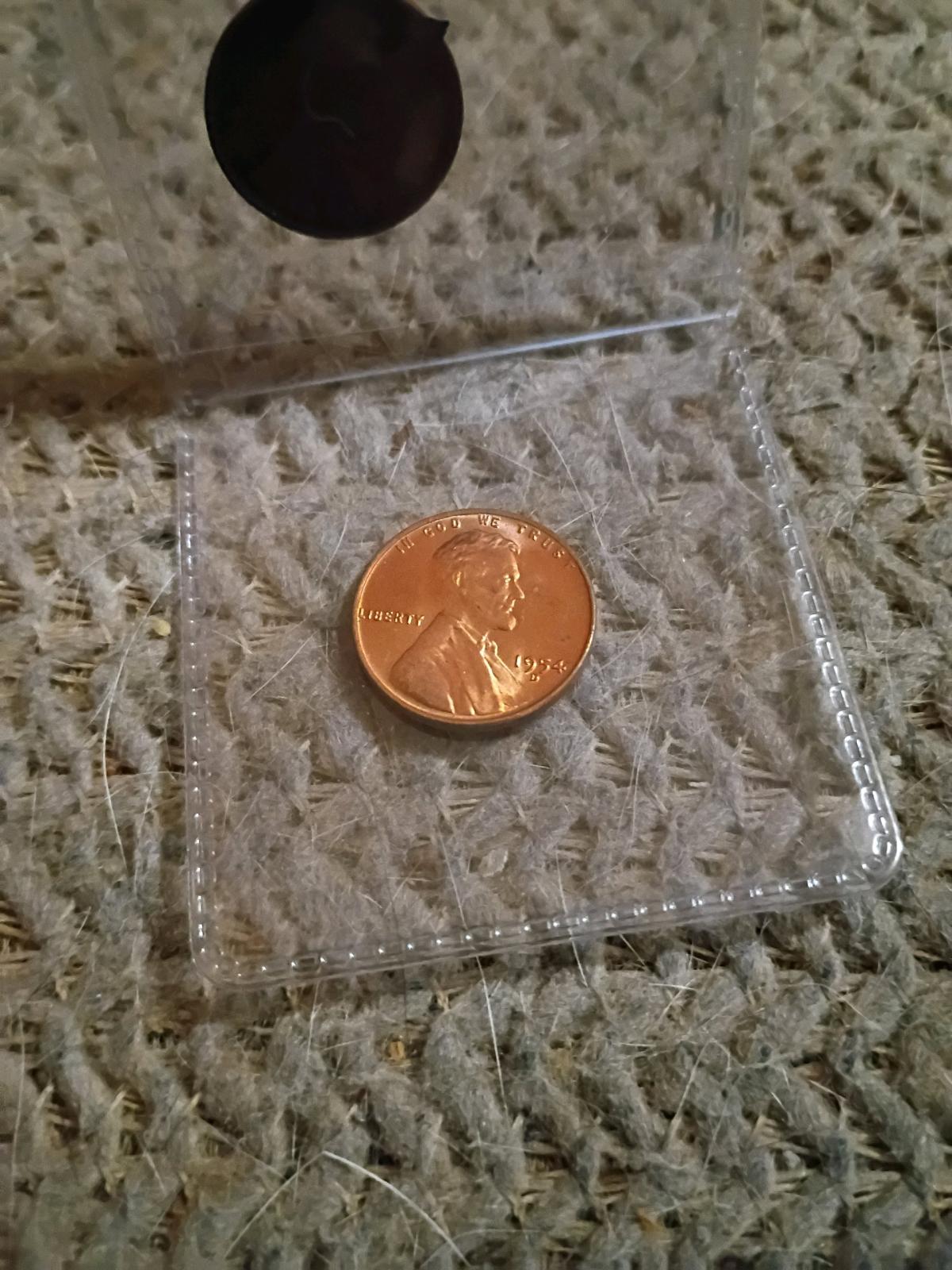 coins 1914 penny and a 1954 penny