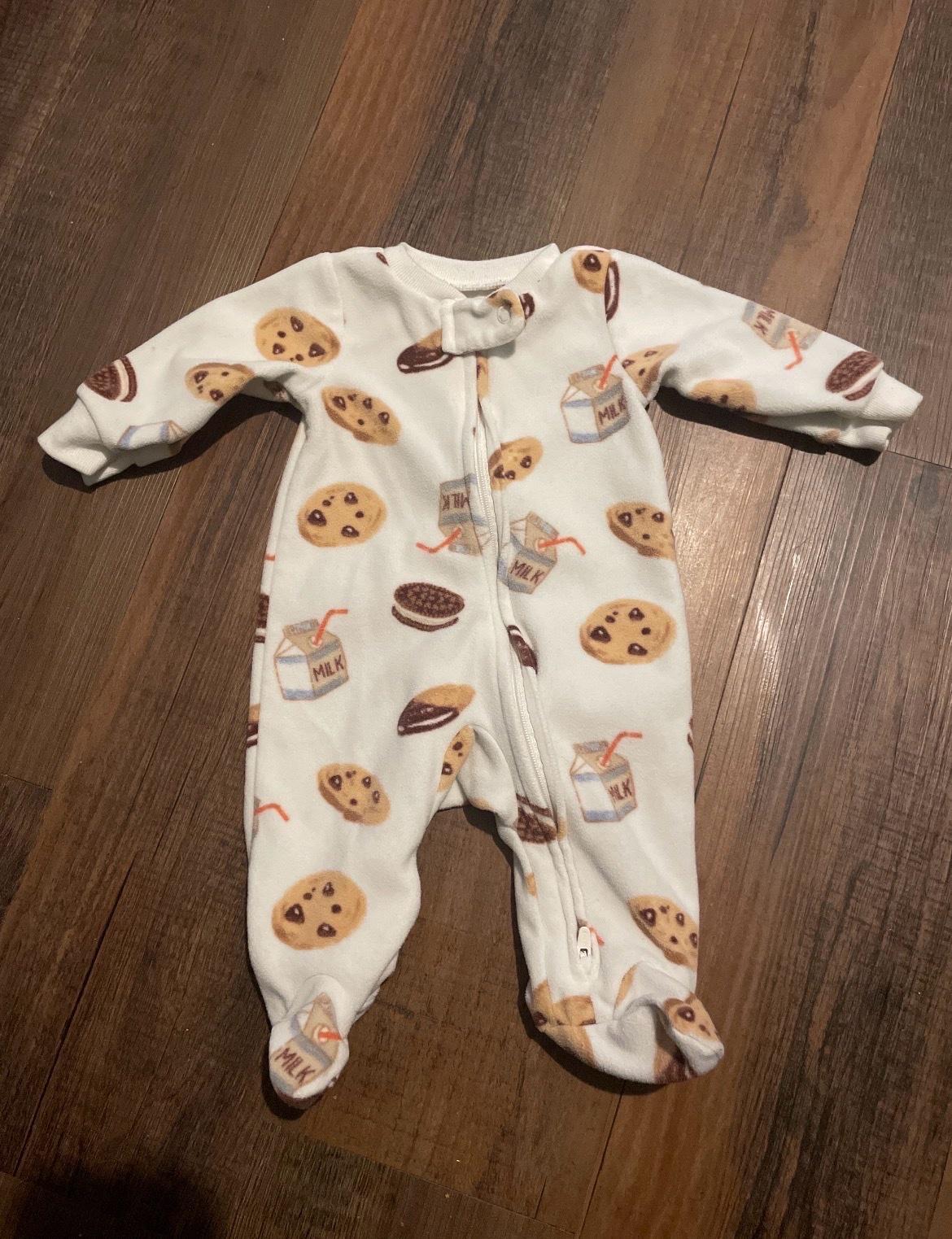 ten baby sleepers ranging in sizes 0 to 3 months