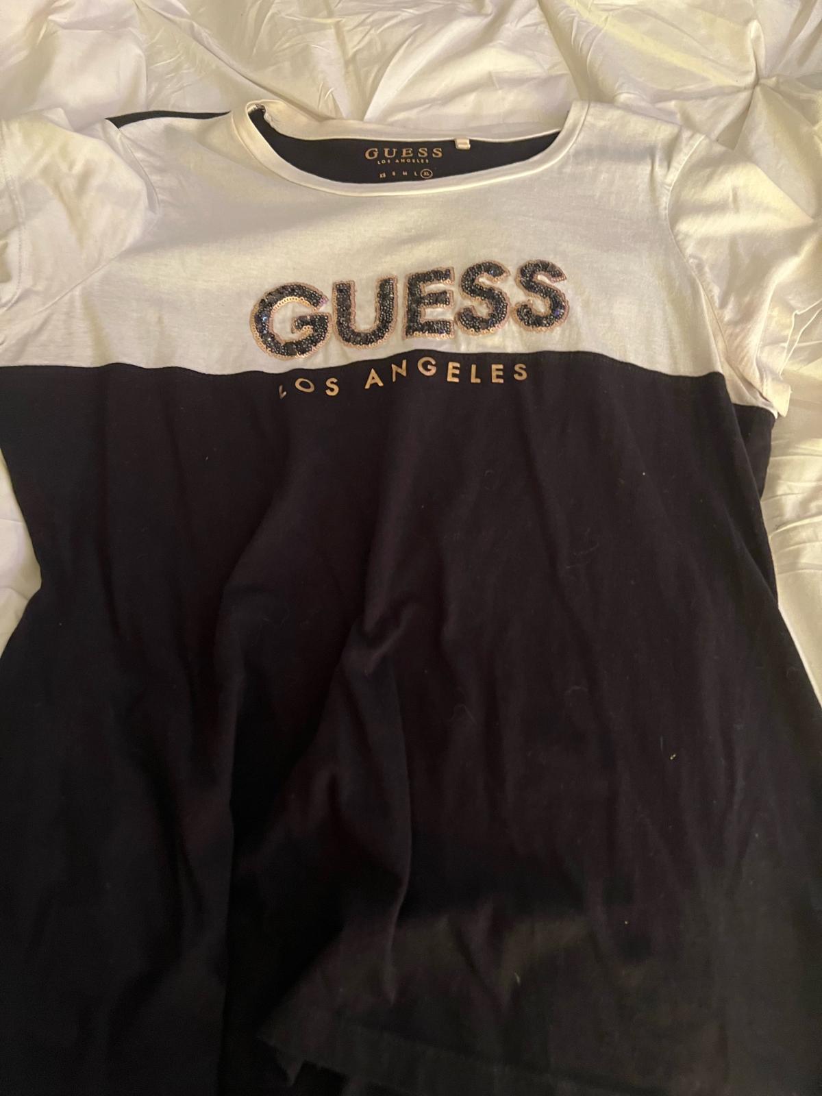 Guess lg T good condition