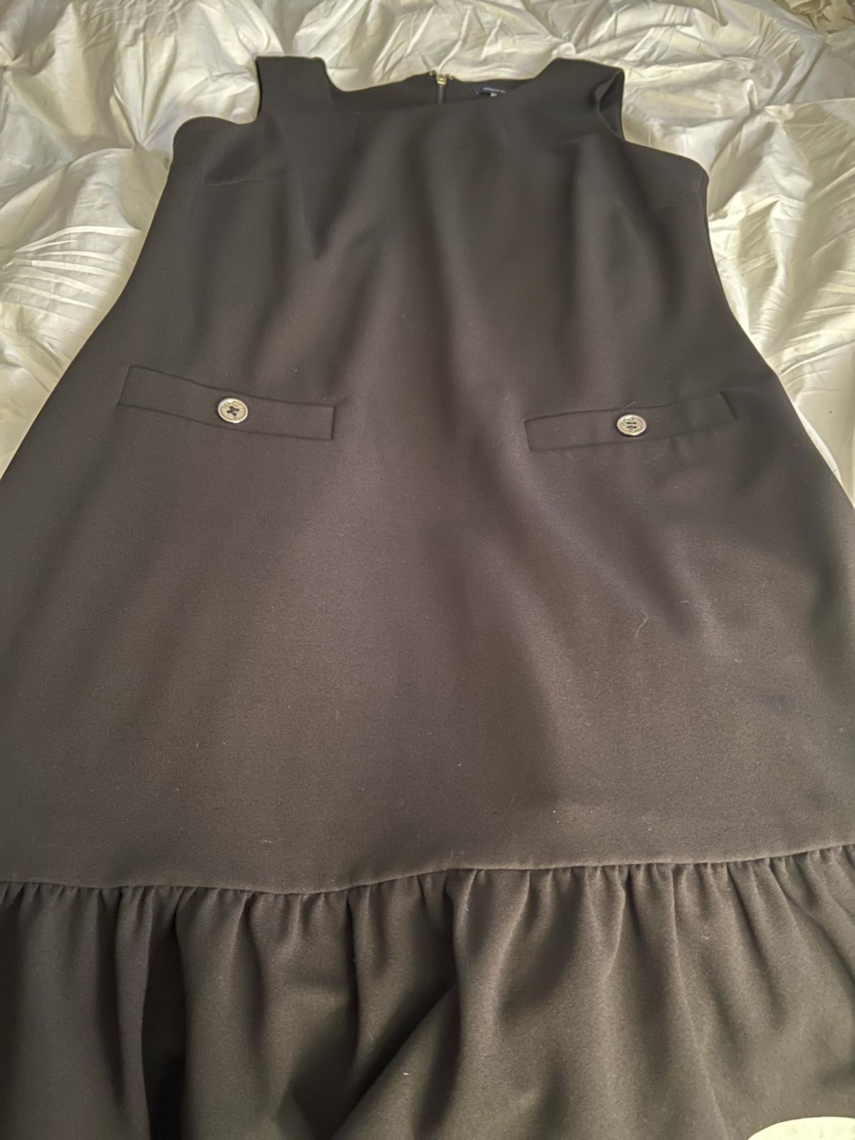 Tommy Hilfiger size large black dress with raw foot bottom