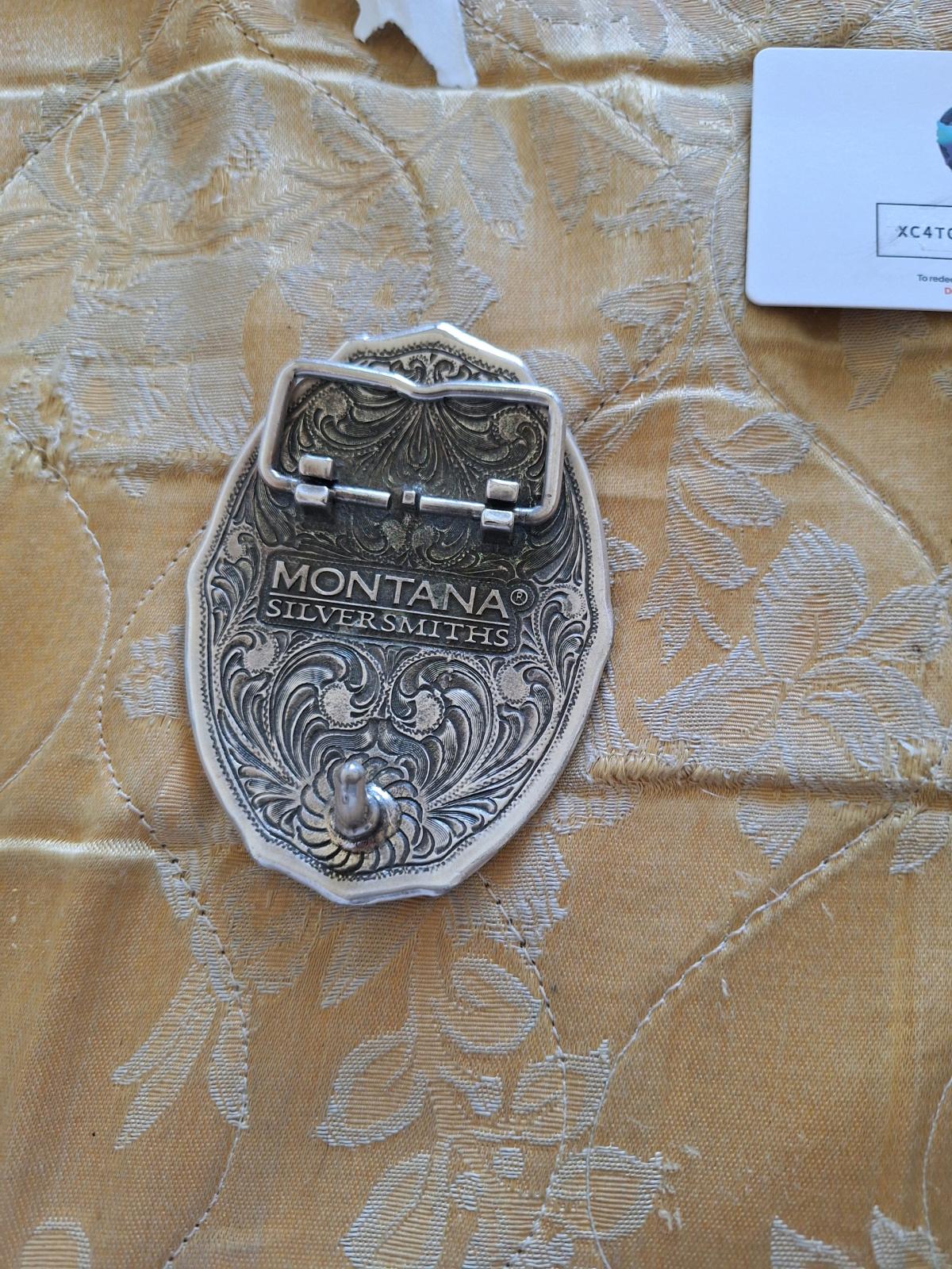 Cross spell buckle
