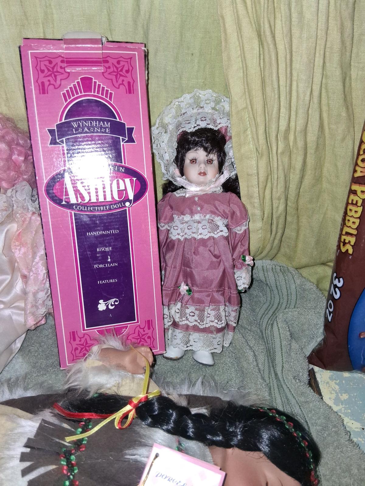 Three Porcelain Dolls plus a Dream Catcher