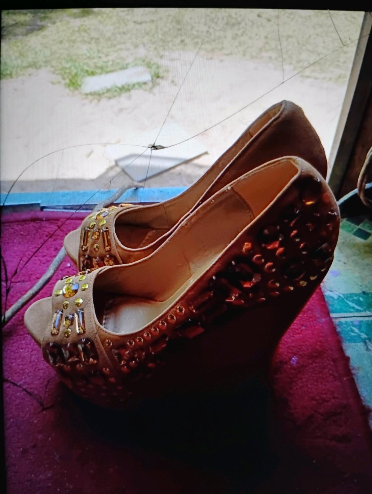 A Nice and Sexy Pair of Tan Platform Heels with Gems