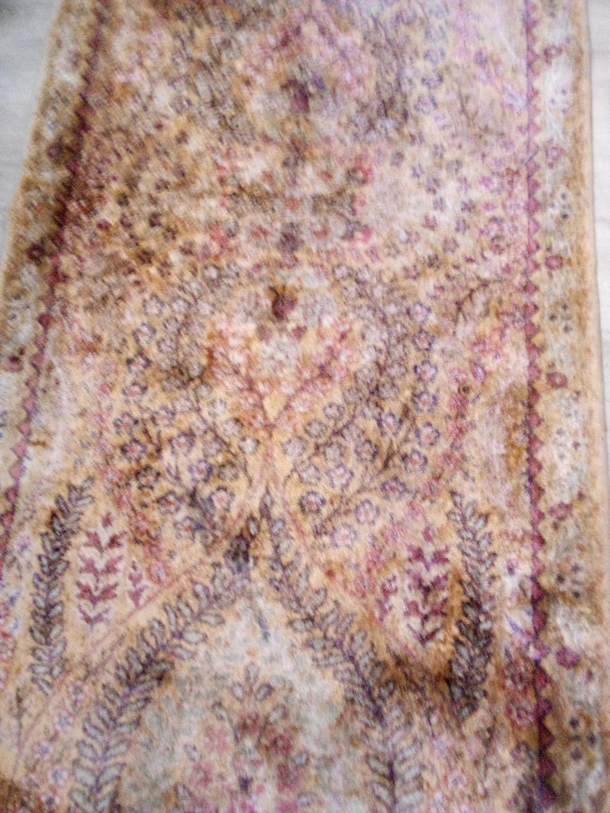 Persian throw rug