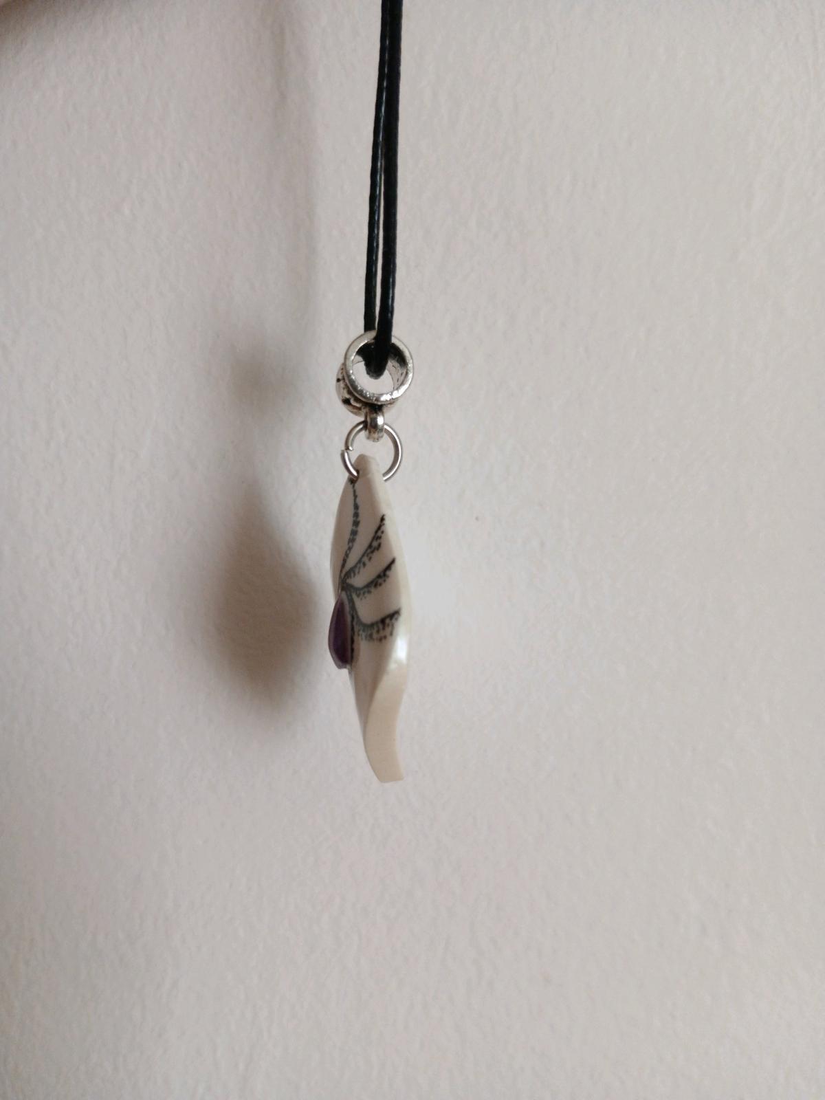 mammoth tusk pendant with natural amethyst