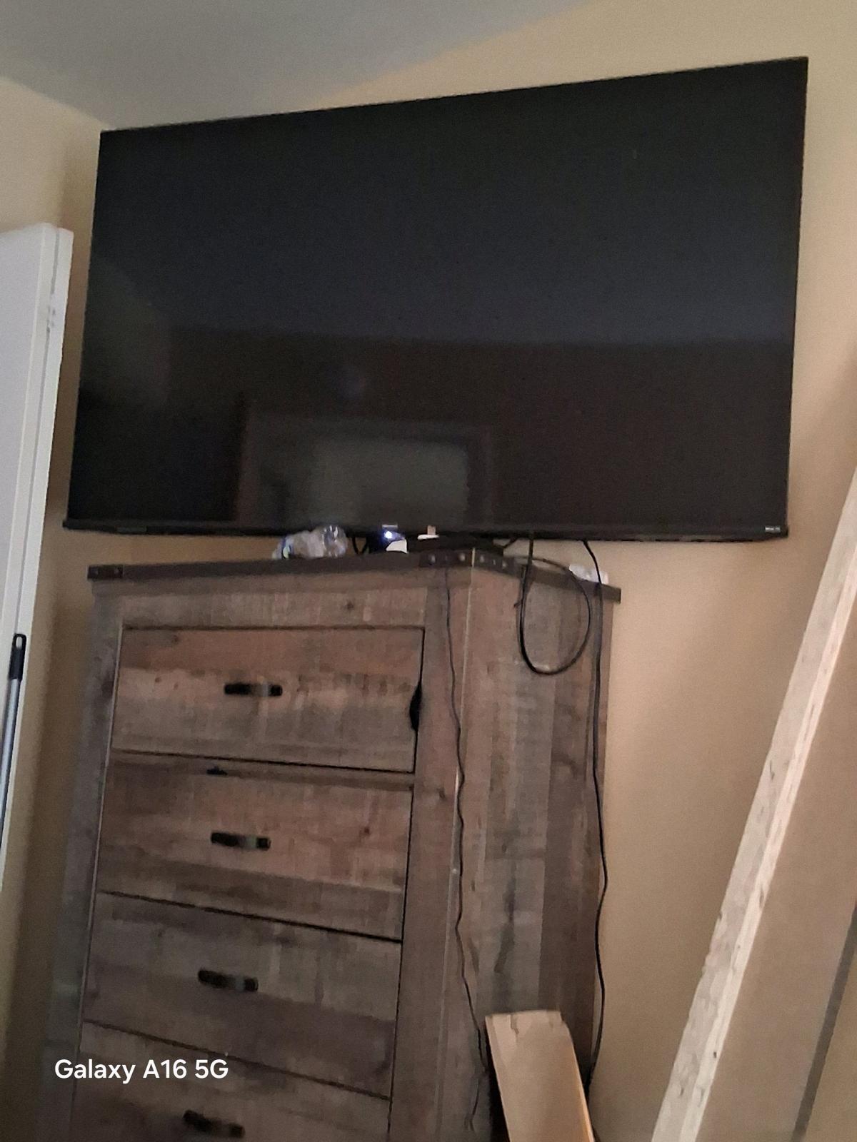 flat screen 56 in Roku flat screen with actual remote