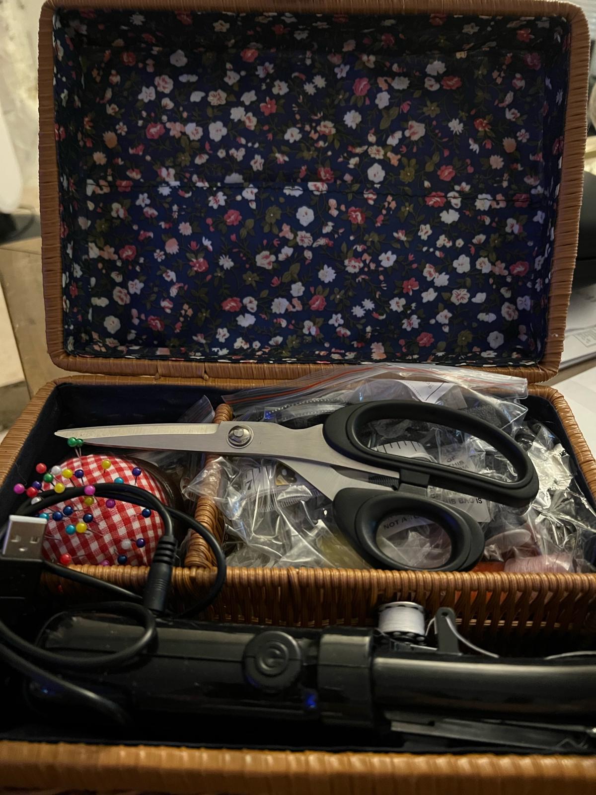 Hand held sewing machine kit never used