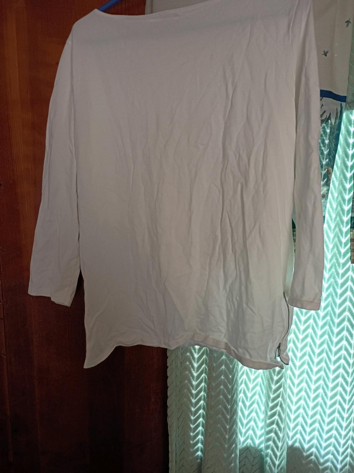 a white shirt never worn been in a drawer
