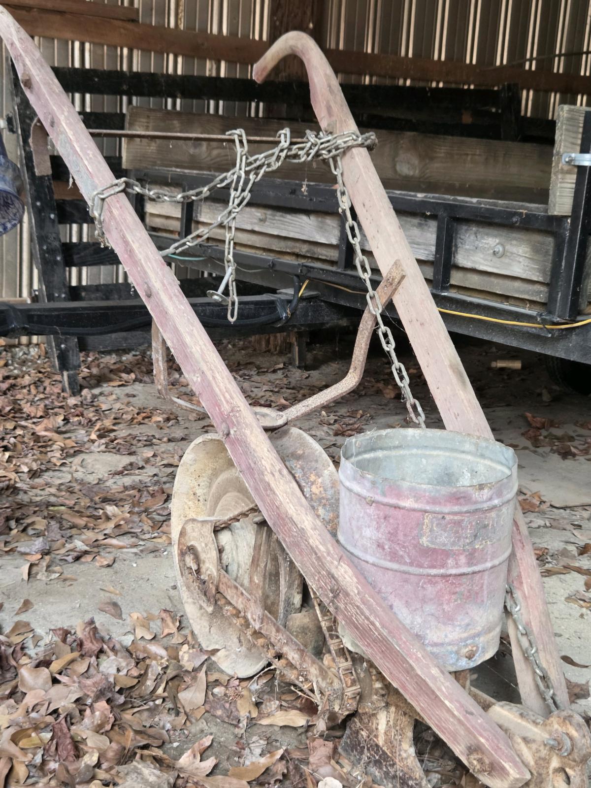 old seed spreader with potential for art