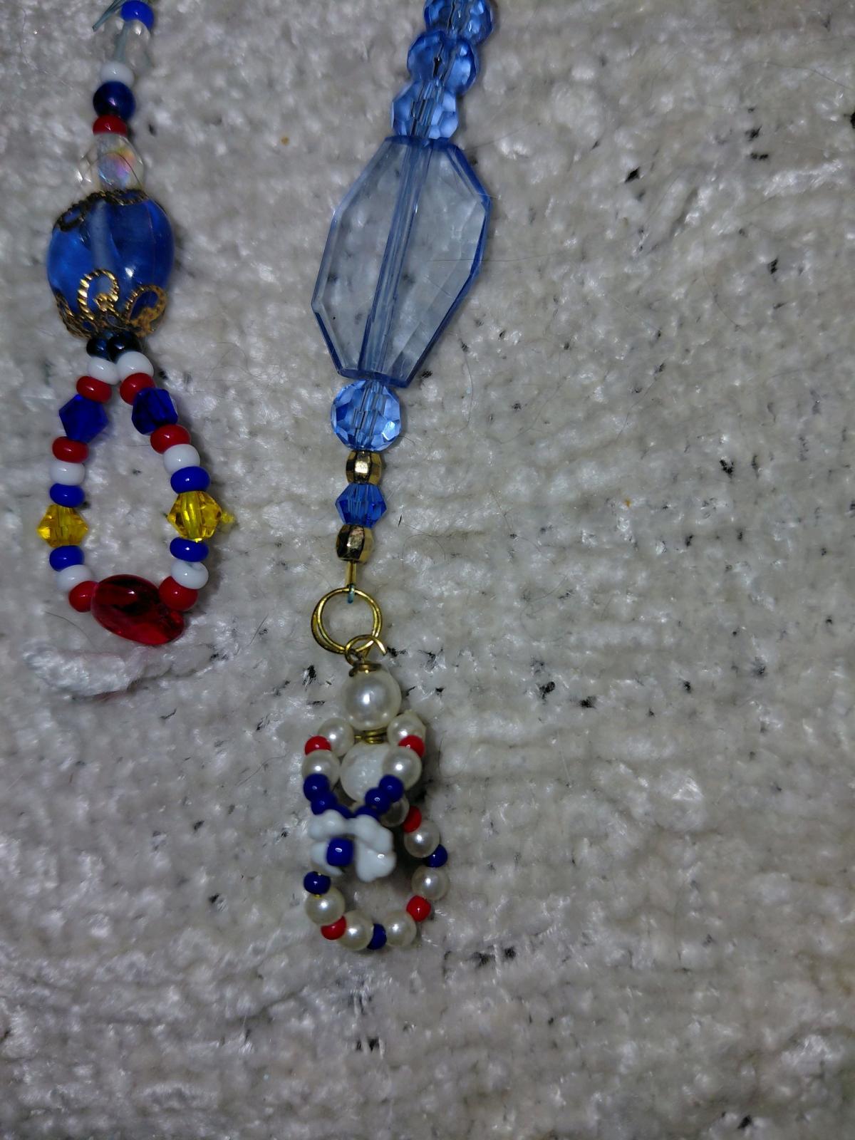 Several key chains zipper pulls and purse accessories