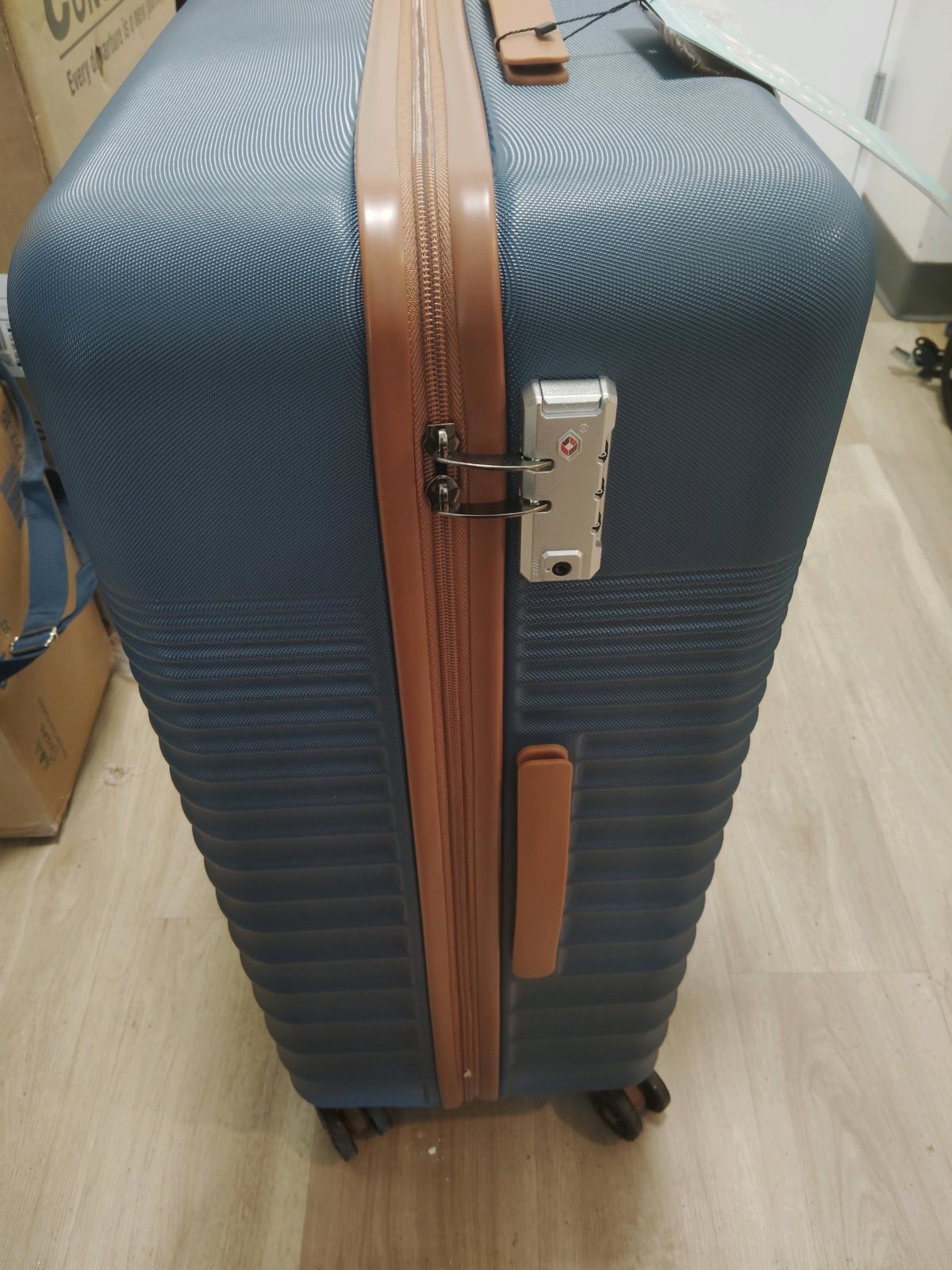 traveling luggage brand new pull behind navy blue very nice