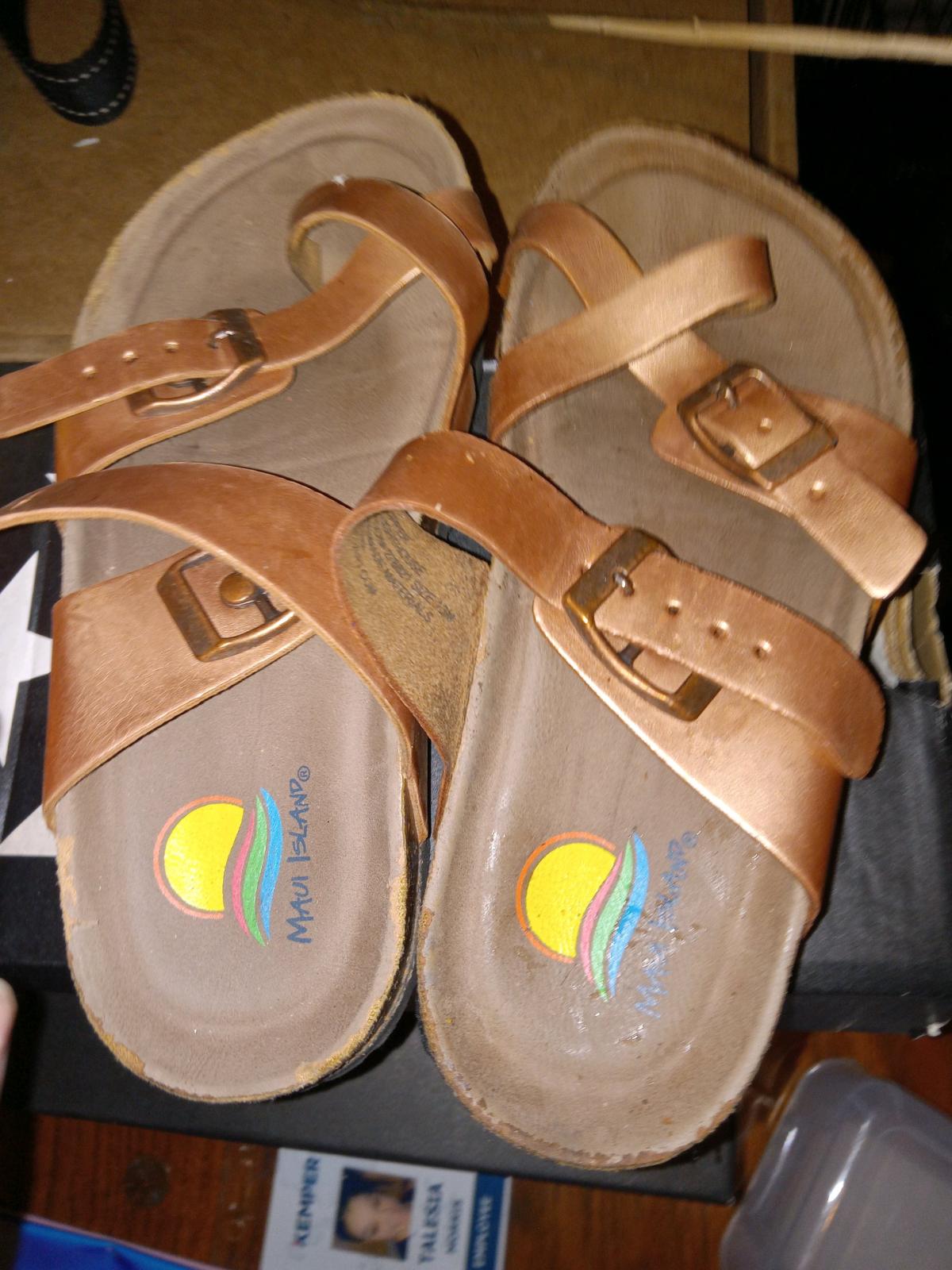 Maui Island sandals featuring rose gold metallic straps and