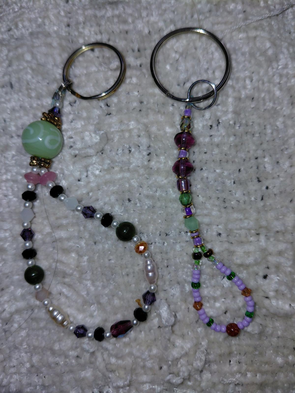 Several key chains zipper pulls and purse accessories