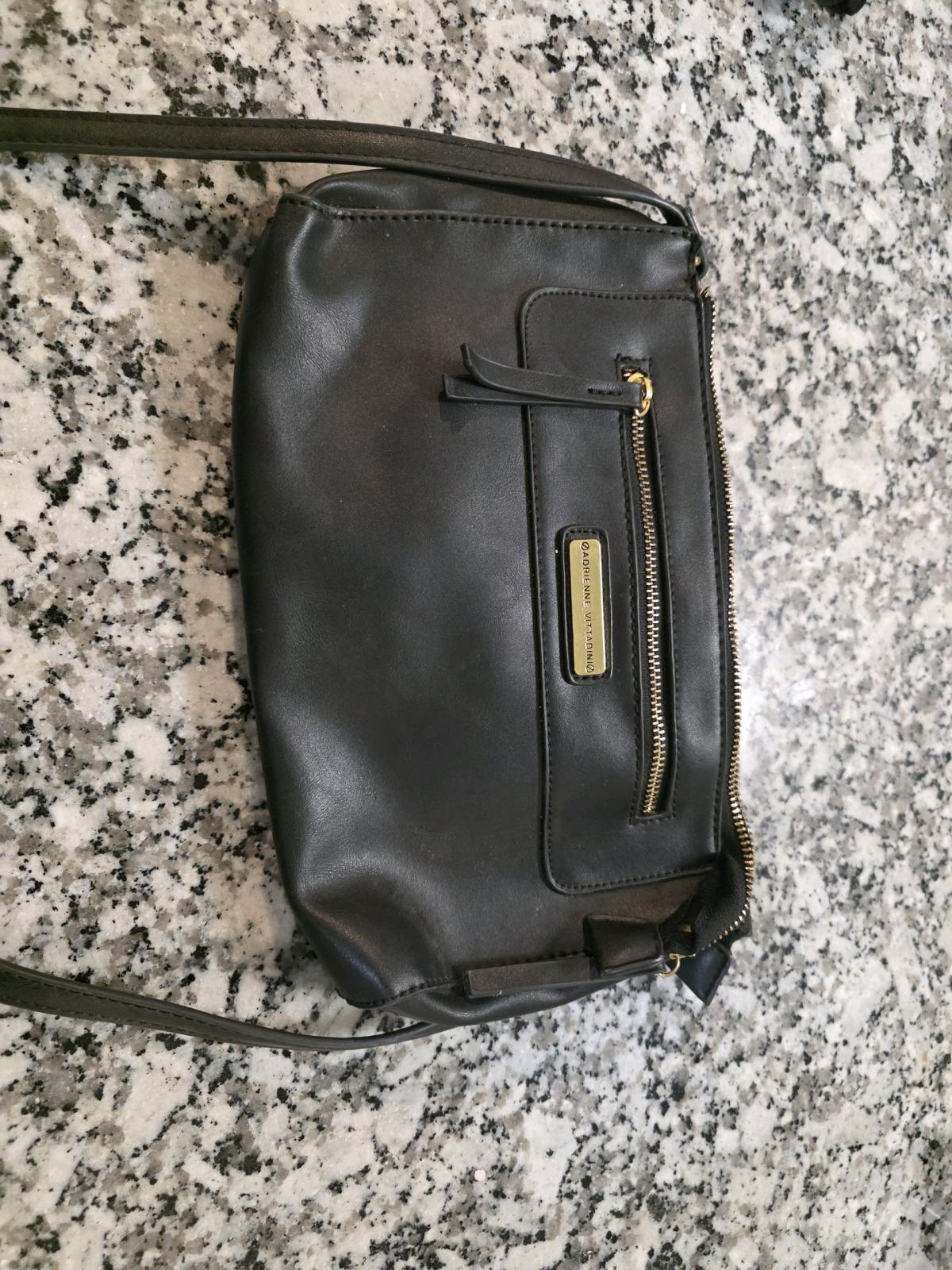 black shoulder back lightly used