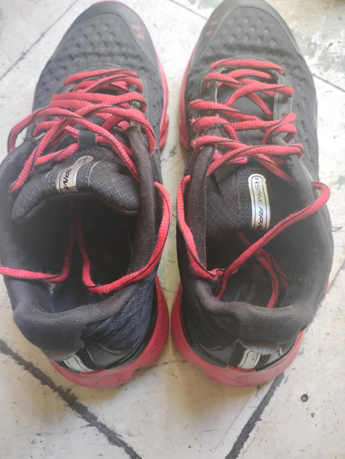 A  Nice Pair of Black and Red UnderArmor Sneakers