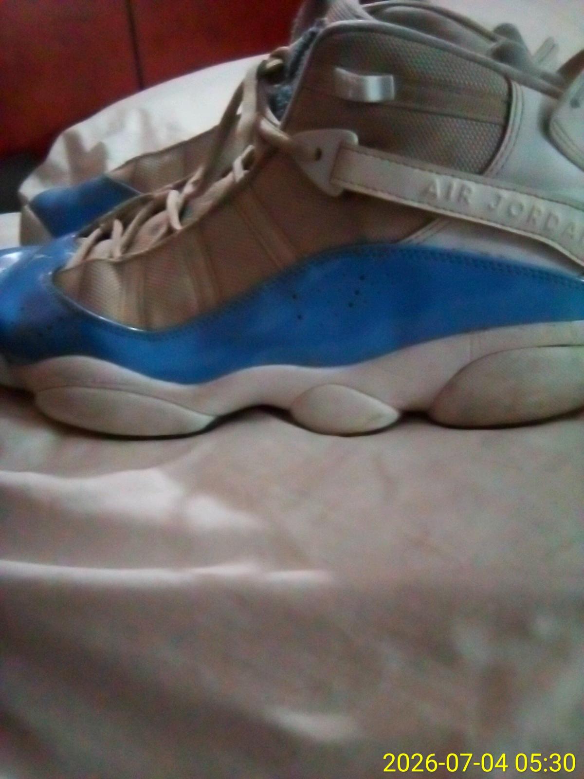 blue and white Jordan 11s mens size 10