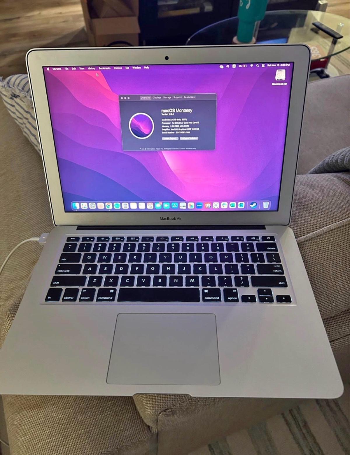 Sleek Silver Apple Laptop  Brand Apple  Color Silver  Minima