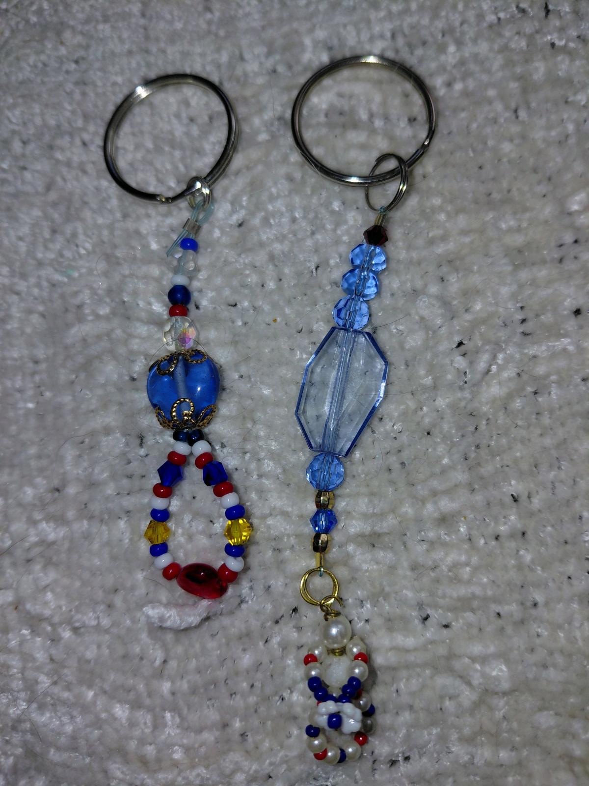 Several key chains zipper pulls and purse accessories