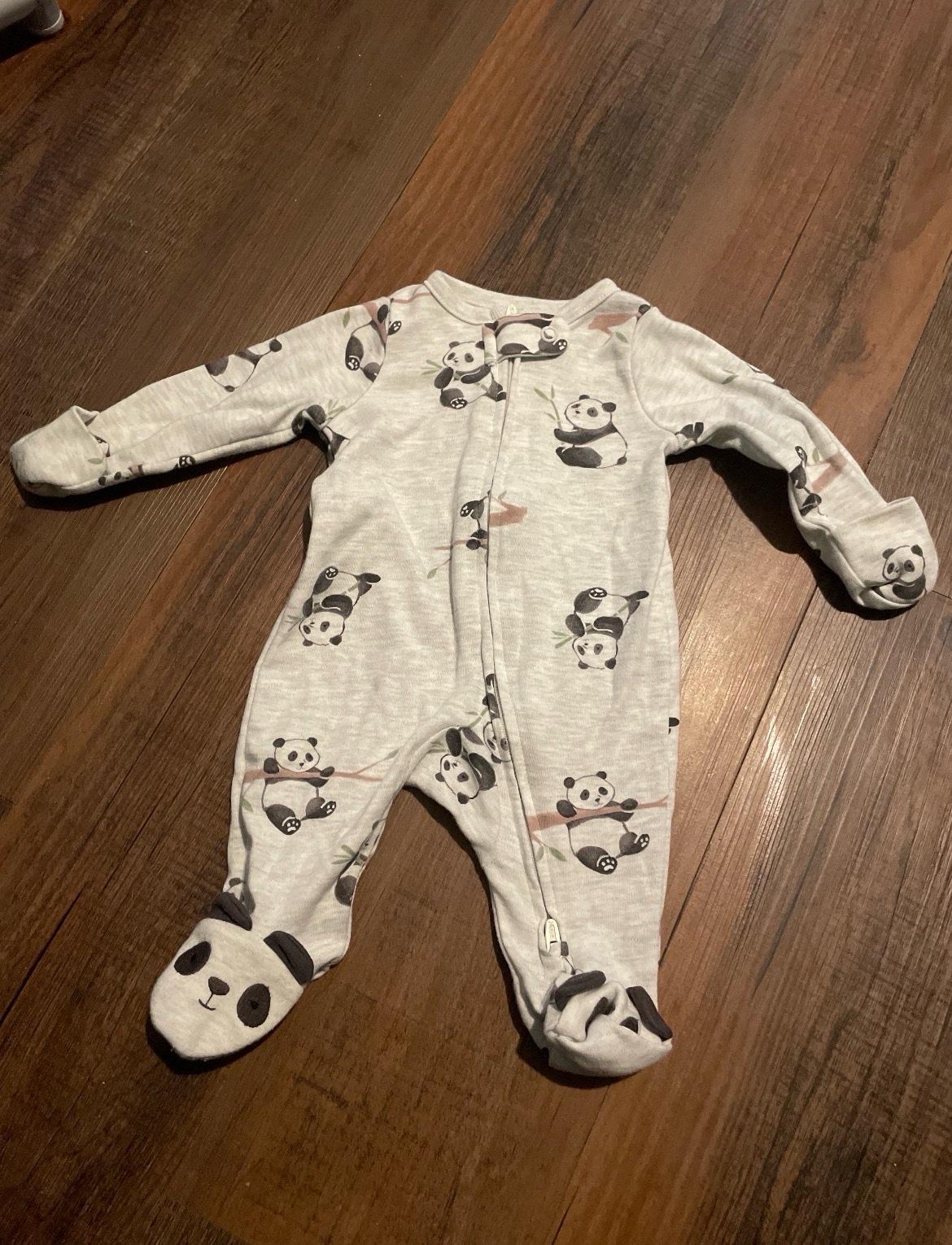 ten baby sleepers ranging in sizes 0 to 3 months