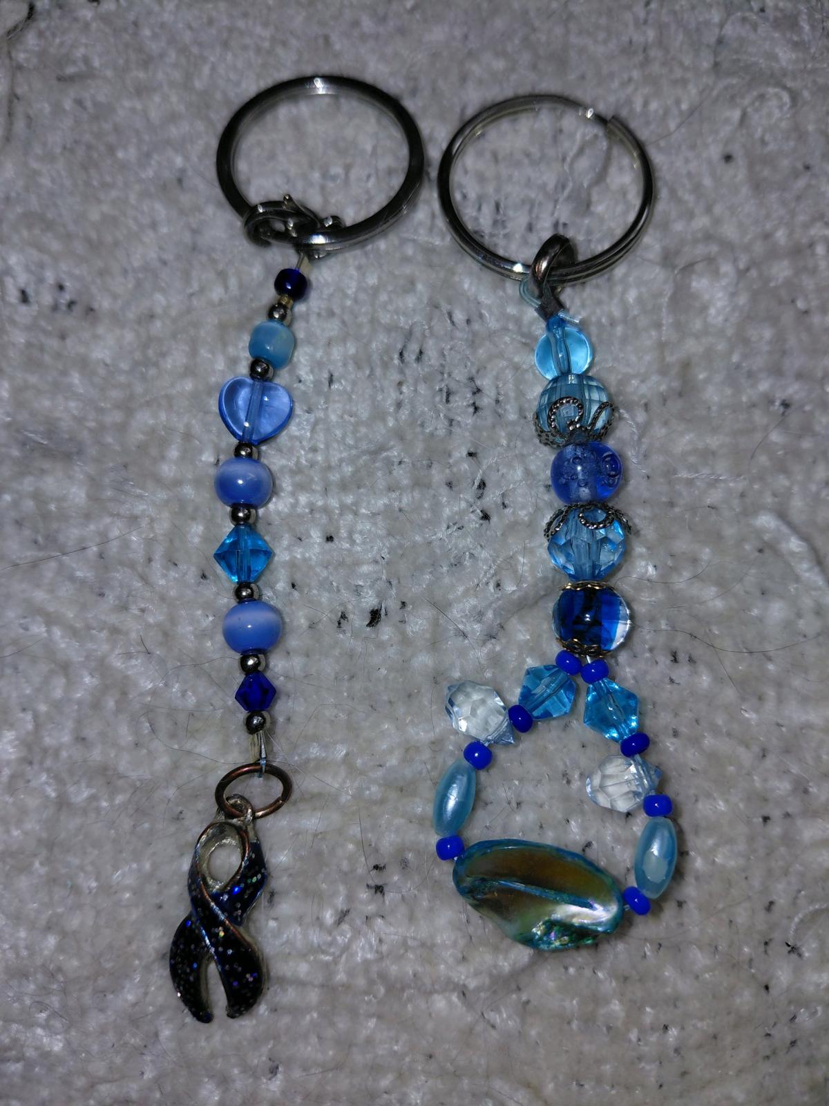 Several key chains zipper pulls and purse accessories