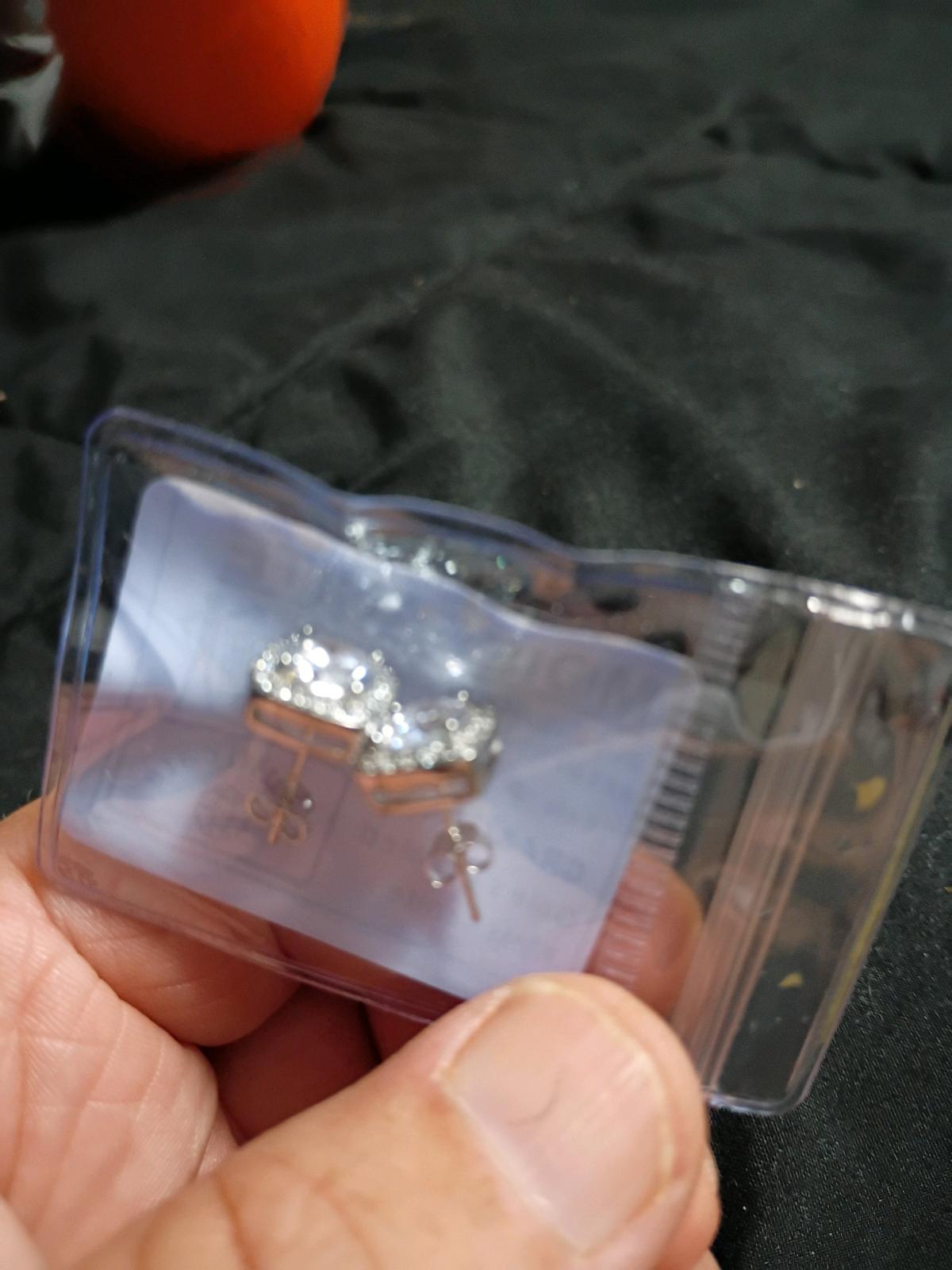 1 carat earrings they retail for 180