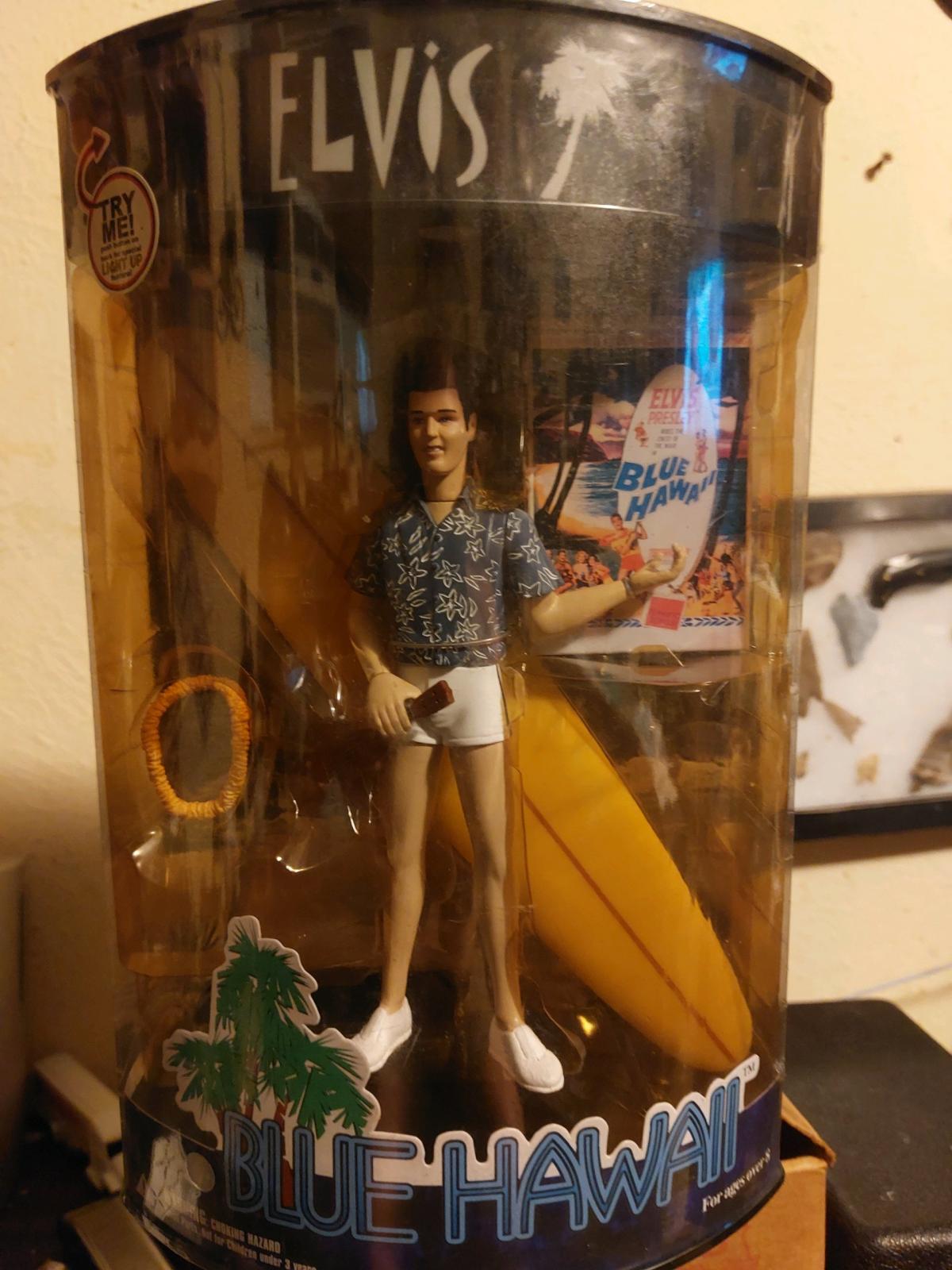 Elvis  blue Hawaii doll with surfboard