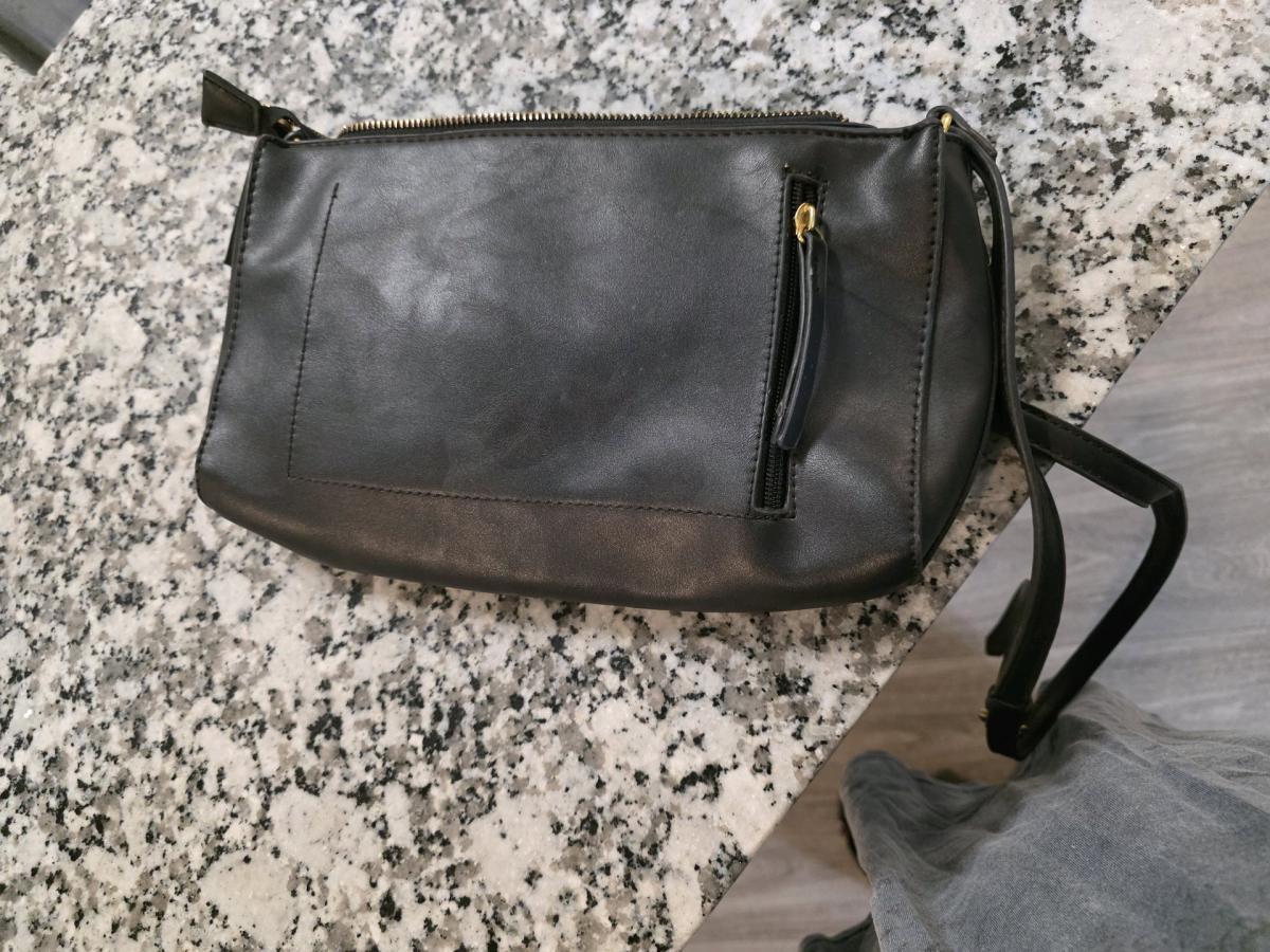 black shoulder back lightly used