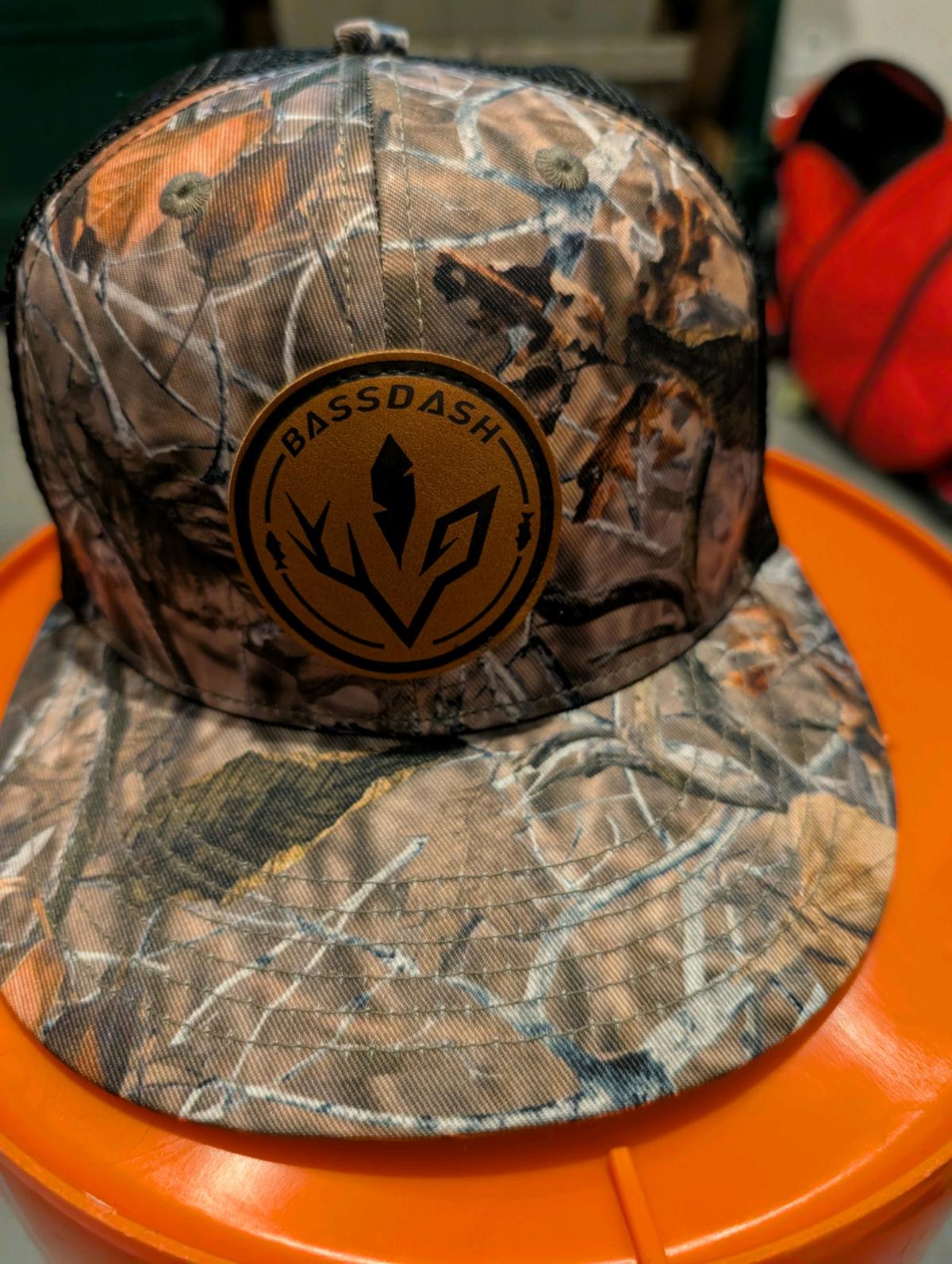 its a BASS DASH CAMO SNAPBACK MENS HAT its been worn ones