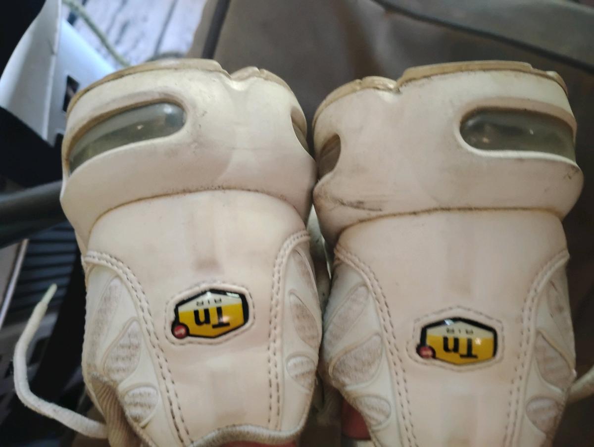 A Nice Pair of White Nike Max plus Athletic Sneakers