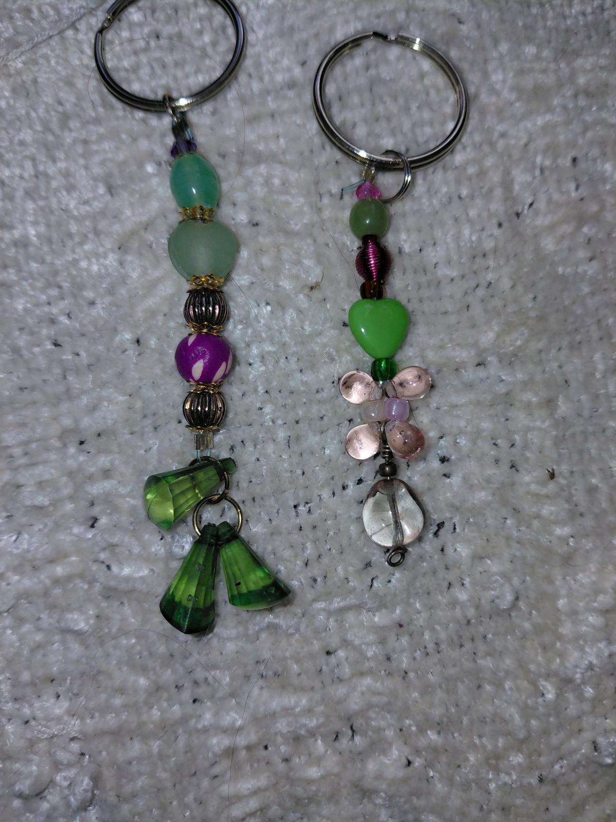 Several key chains zipper pulls and purse accessories