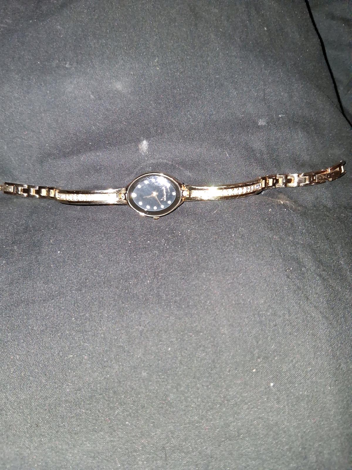 Cynthia Rowley purse and armitron watch