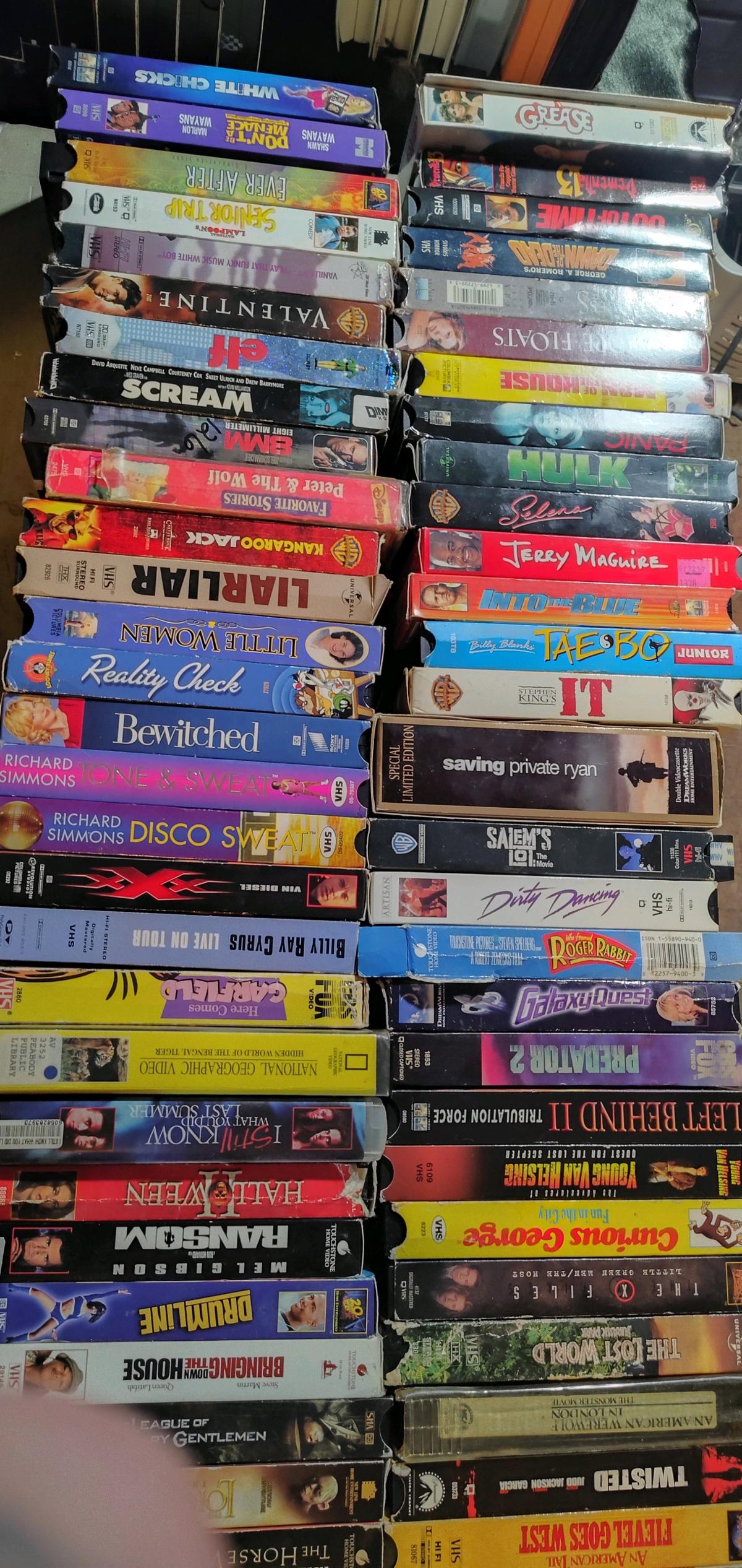 lot of DVDs and VHS types Android shape