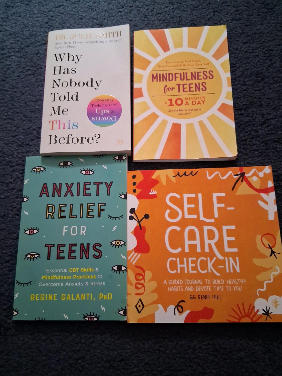 Four Hardcover books and four soft