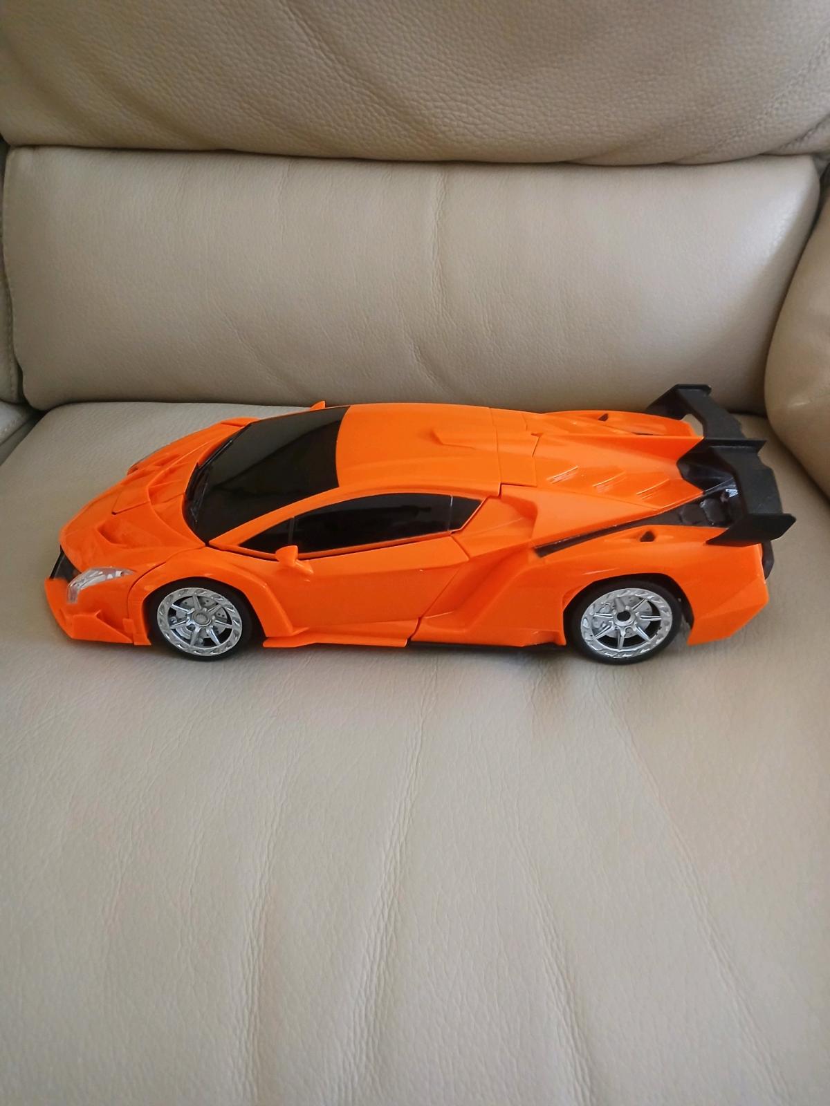 Toy car bundle orange car can turn into a robot