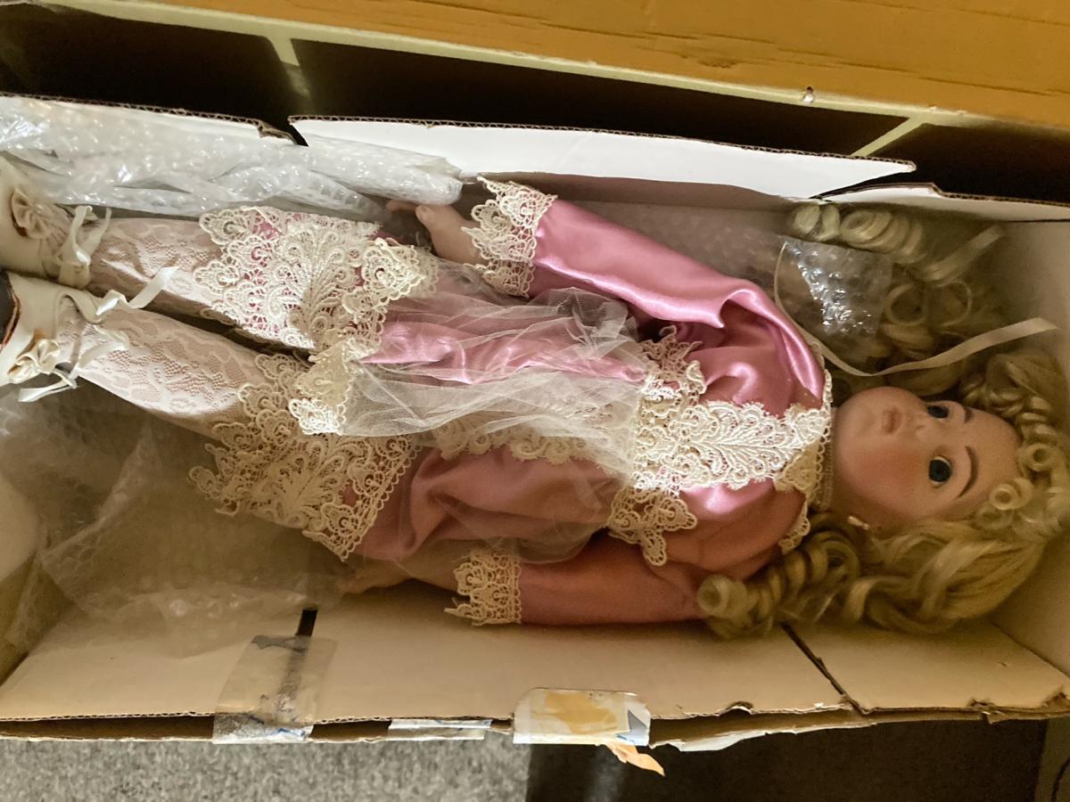 making room to give some lucky family a nice antique dolls