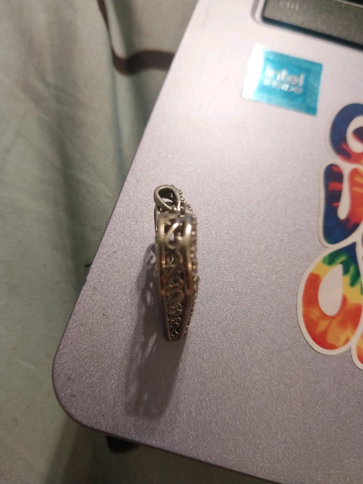 Silver Heart Pendant with an infinity sapphire stone