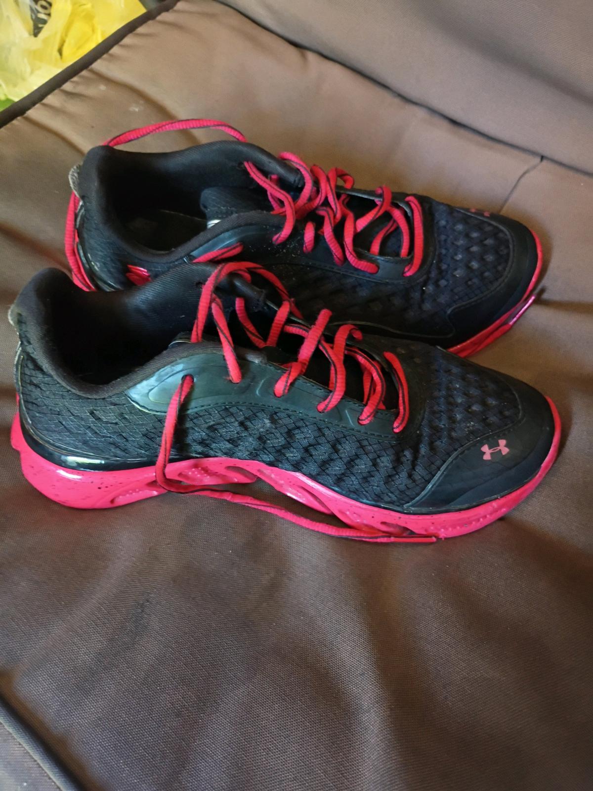 A Nice Pair of Red and Black UnderArmor Sneakers