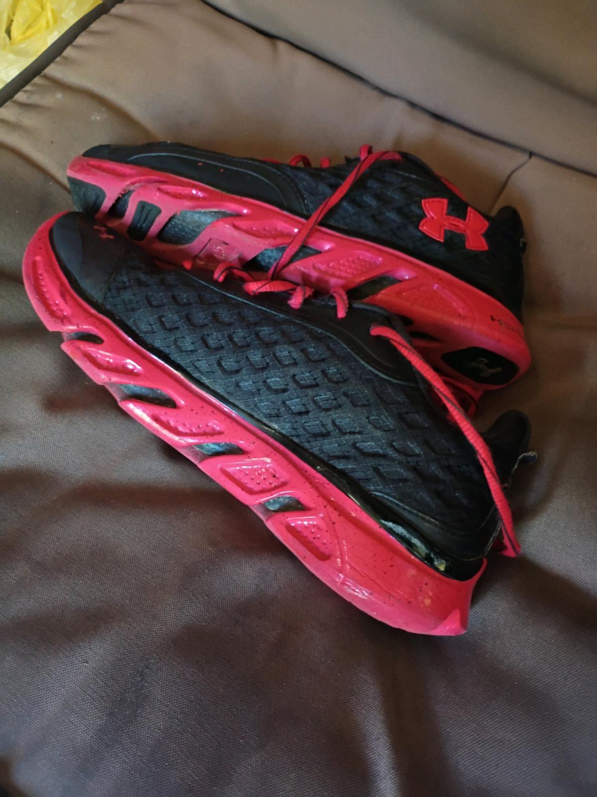 A Nice Pair of Red and Black UnderArmor Sneakers