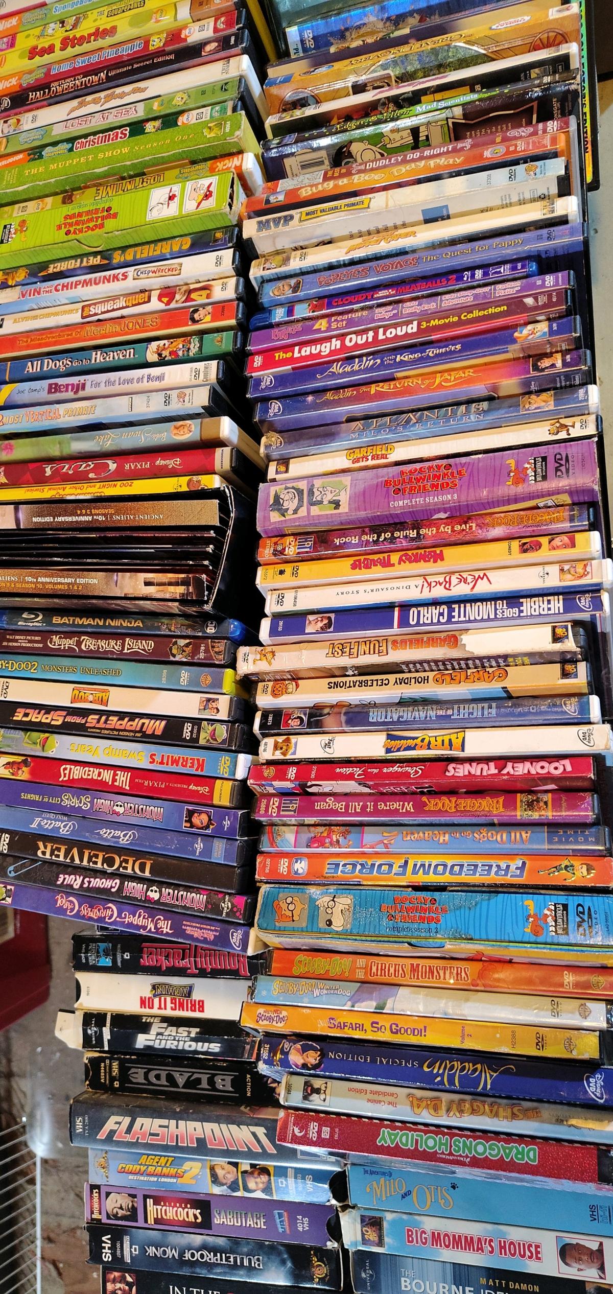lot of DVDs and VHS types Android shape