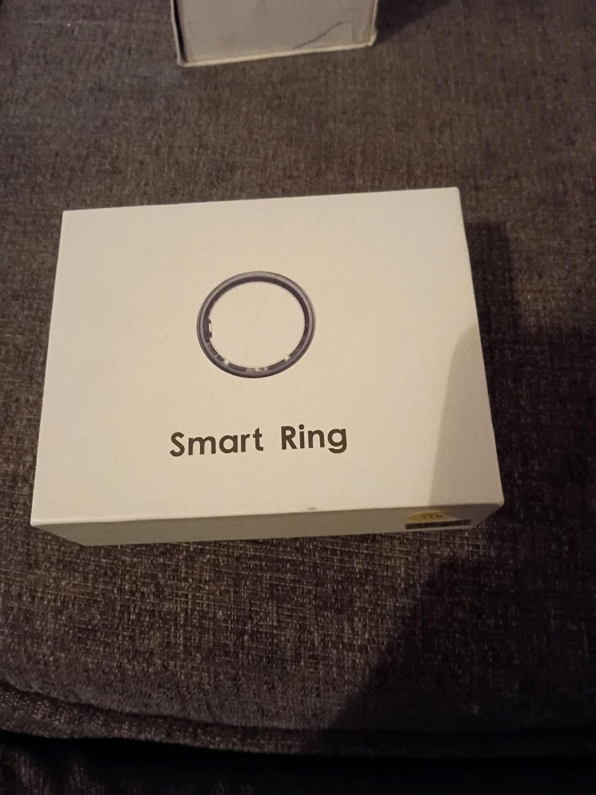 smart ring gold box open but never used still has everything
