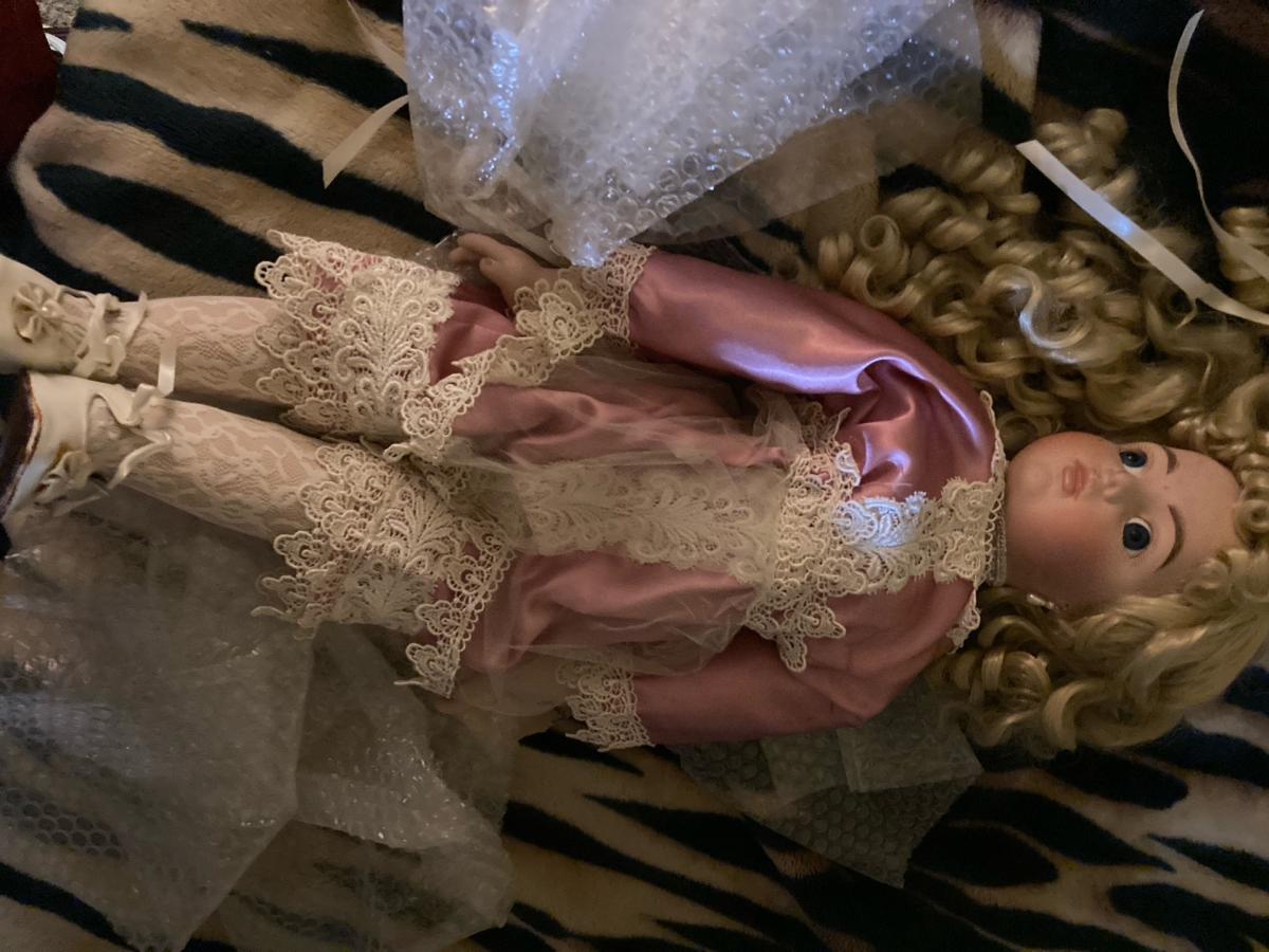 making room to give some lucky family a nice antique dolls
